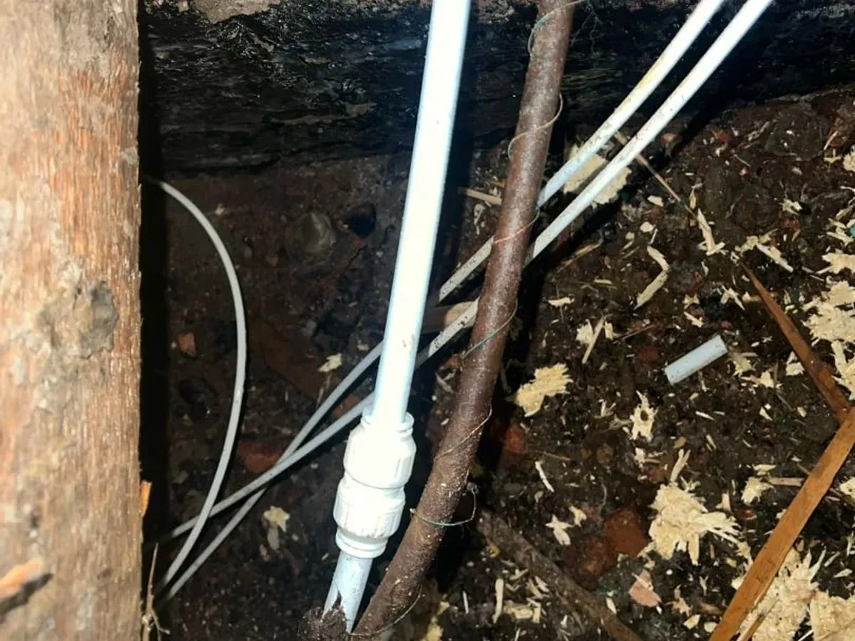 New pipework with compression fittings under the lifted floor